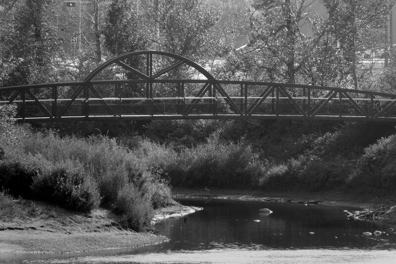 Arch Bridge over River — Black