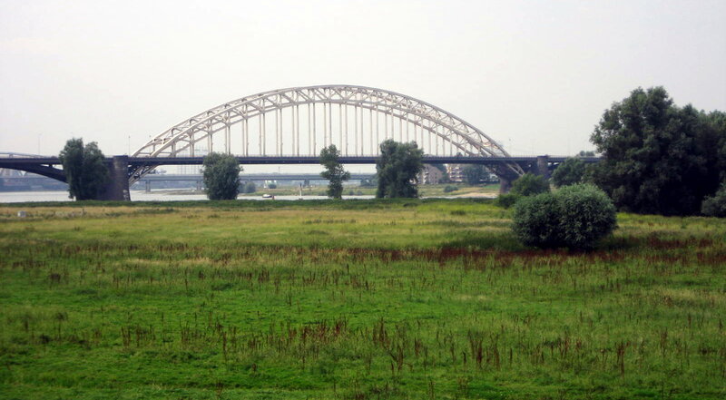 Arch Bridge over River — Green, Calm