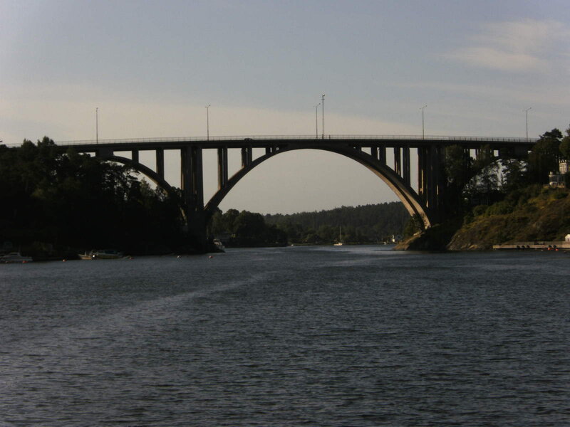 Arch Bridge over Water — Blue, Calm