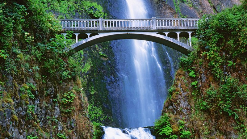 Arch Bridge over Waterfall