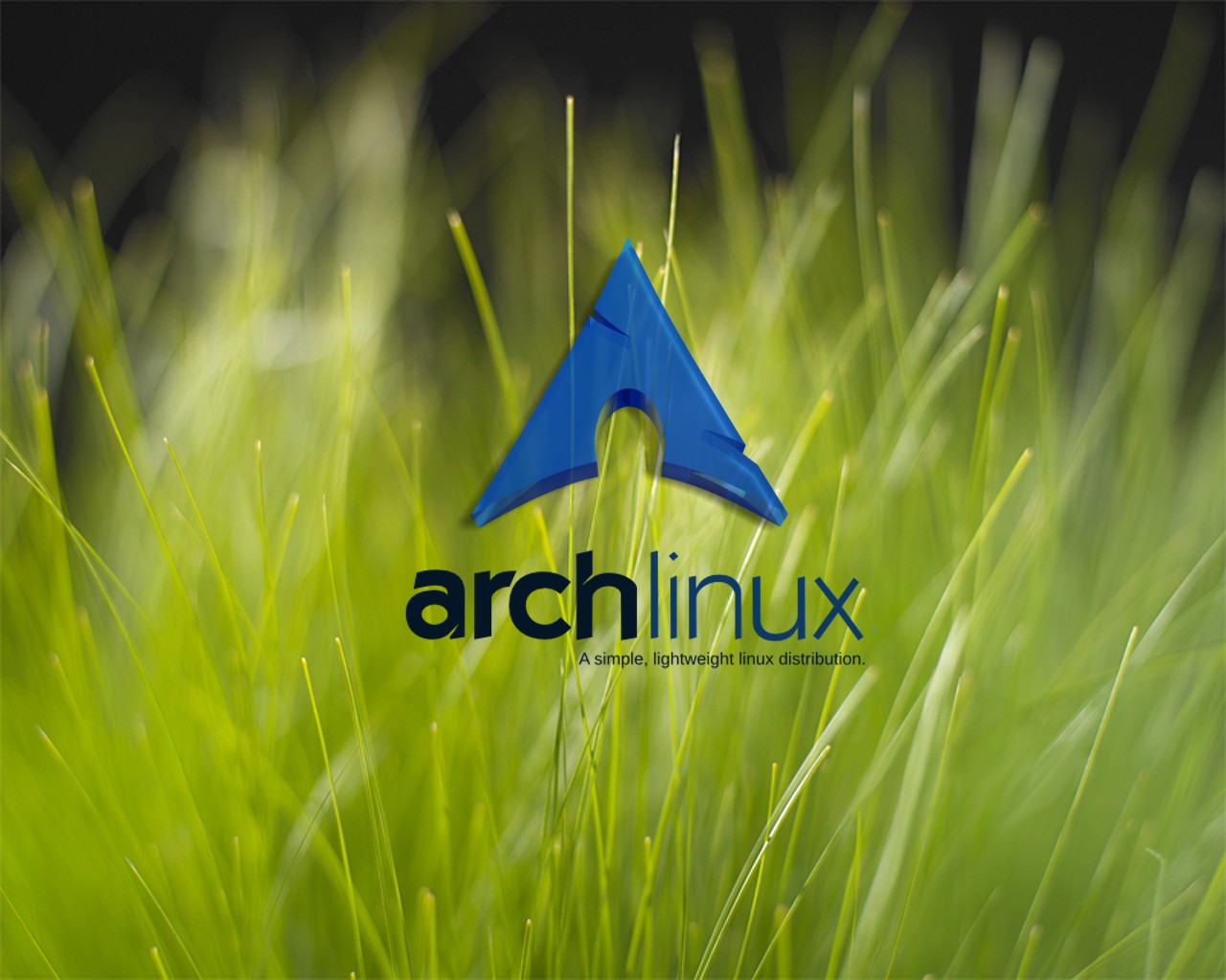 Arch Linux logo on grass