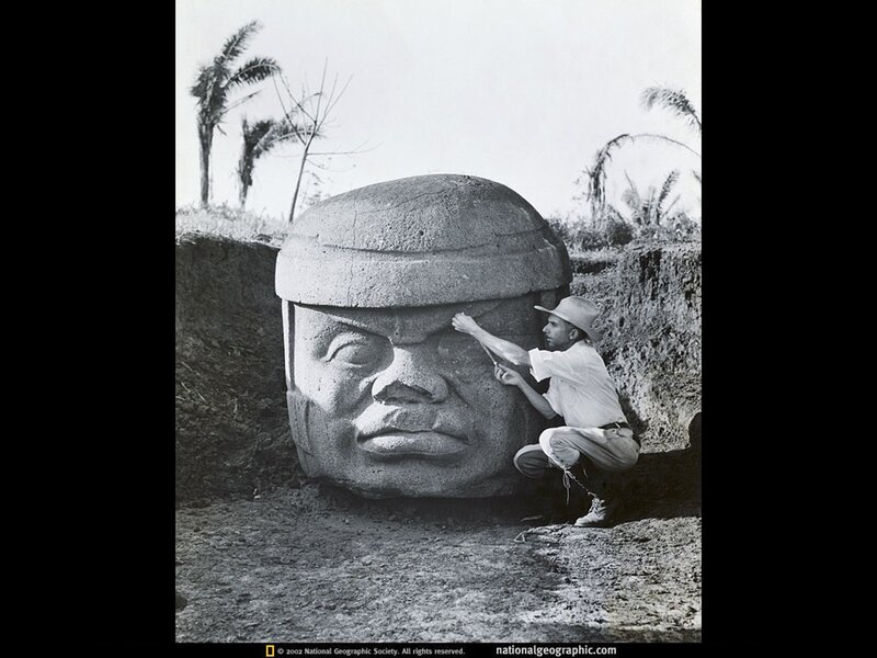 Archaeologist at Olmec head