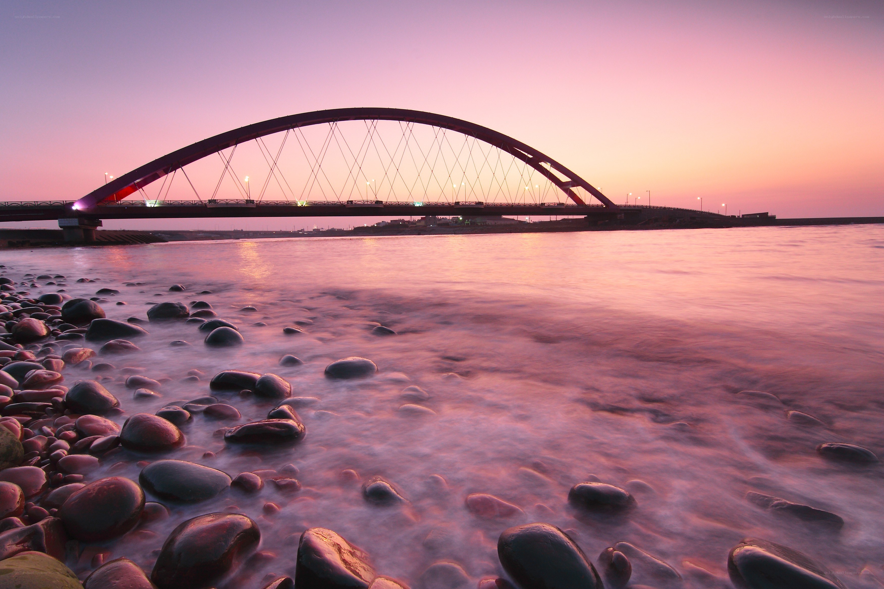 Arched bridge at sunset