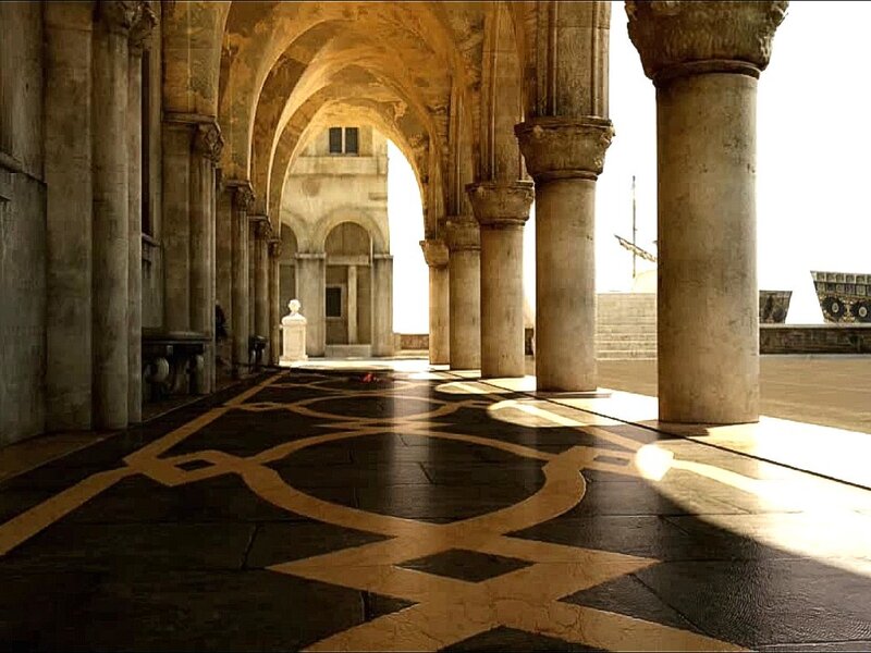arched colonnade with patterned floor