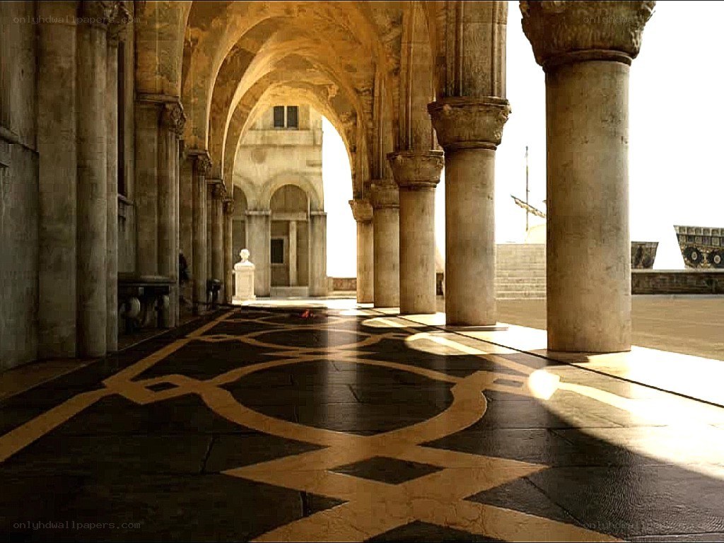 arched colonnade with patterned floor