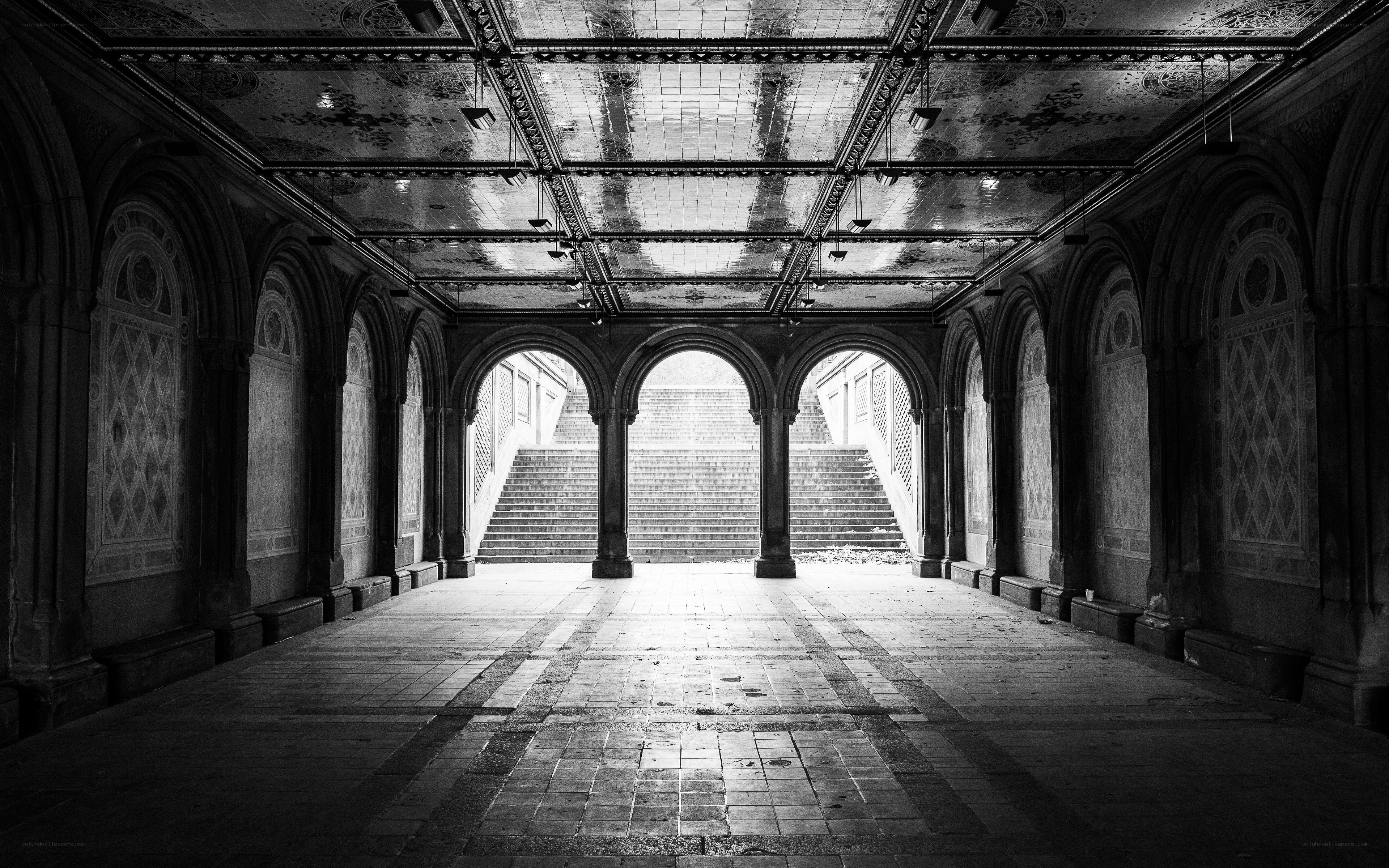 arched corridor with stairs