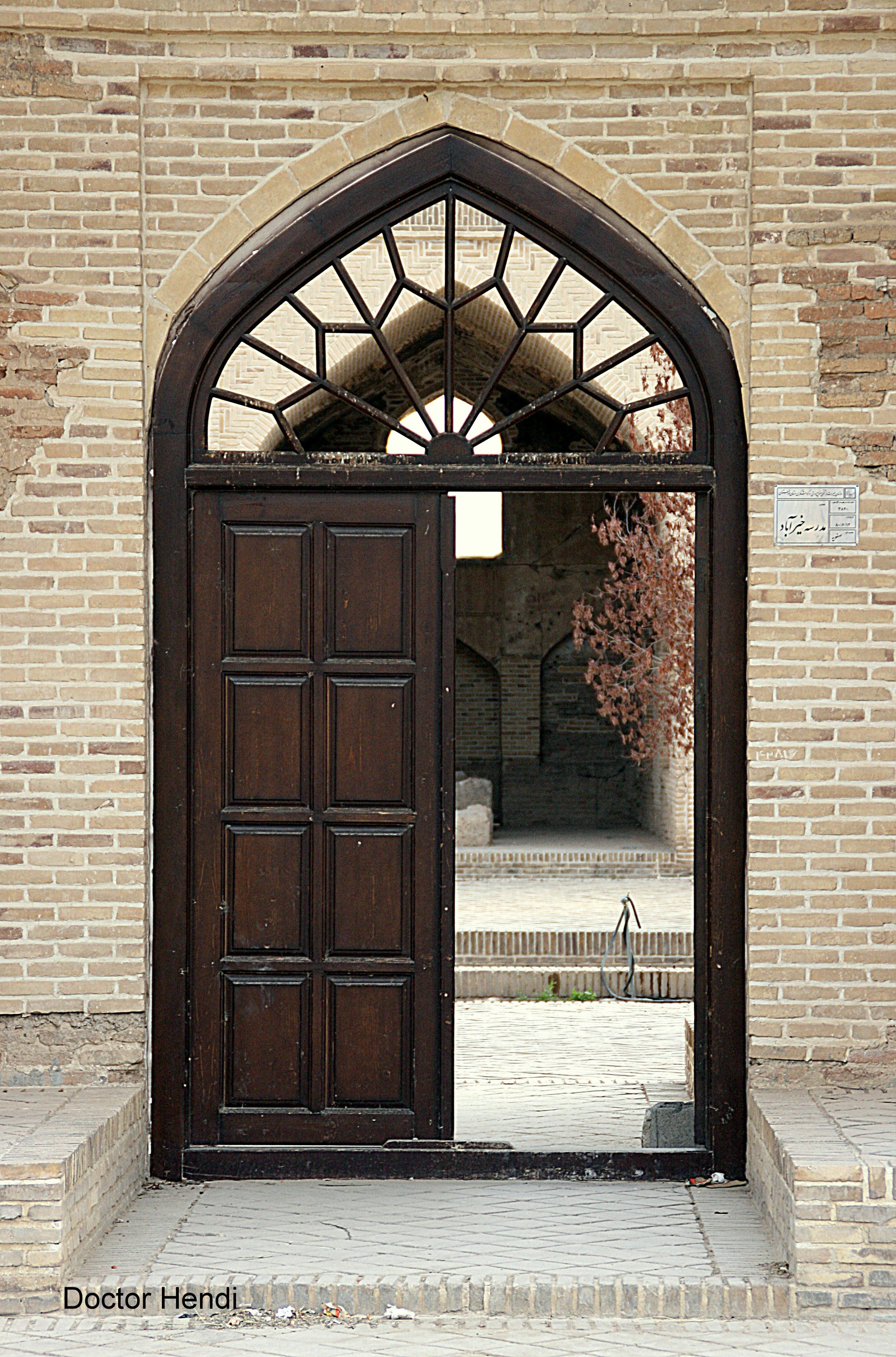 Arched doorway in brick building