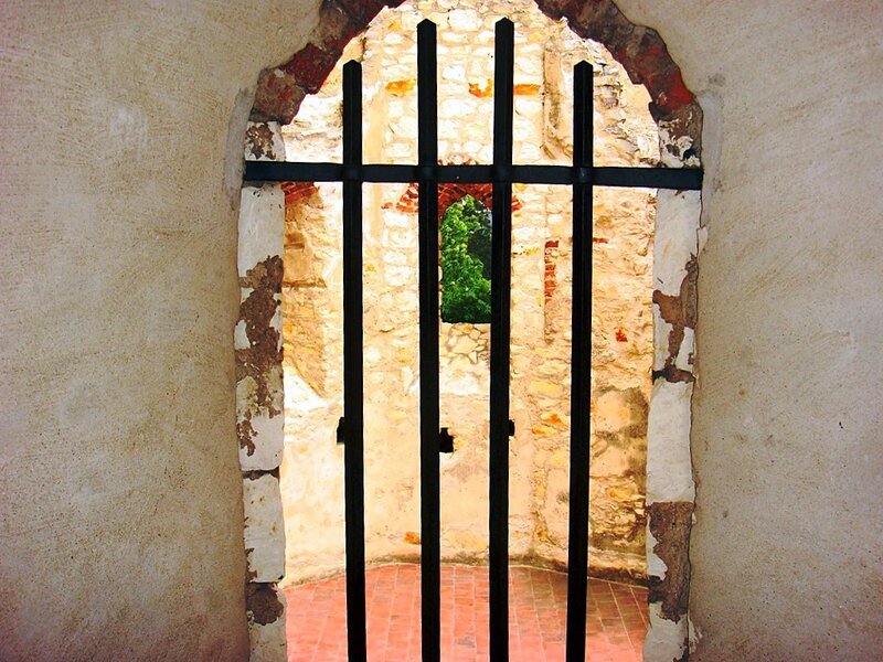 Arched Window with Bars