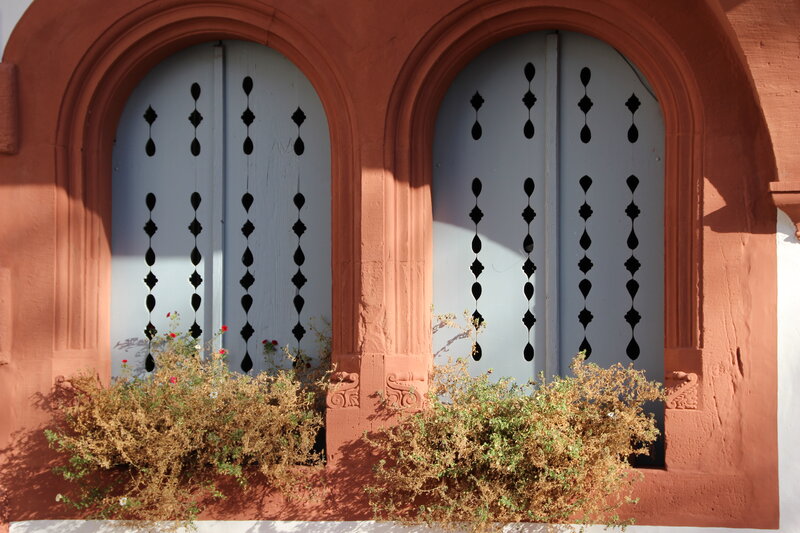 Arched Windows with Shutters