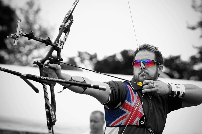 archer aiming a bow