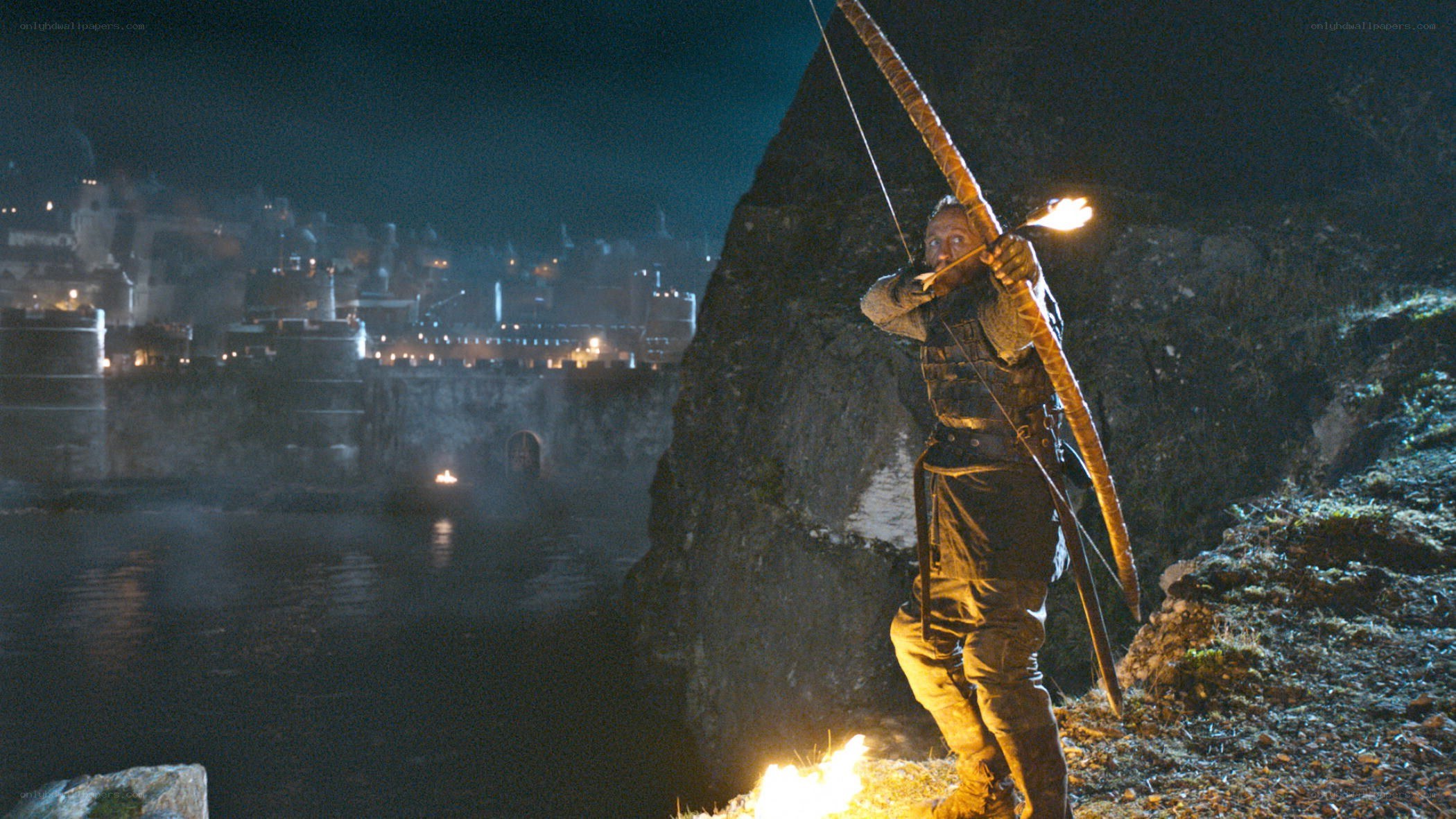 archer at night with city view
