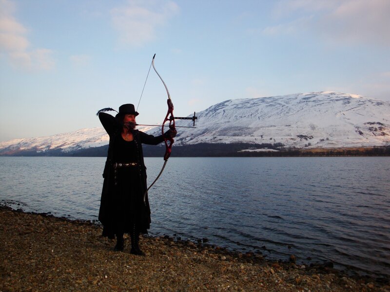 Archer by a lake