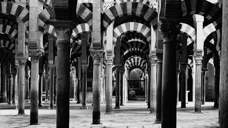arches and columns in a historic hall