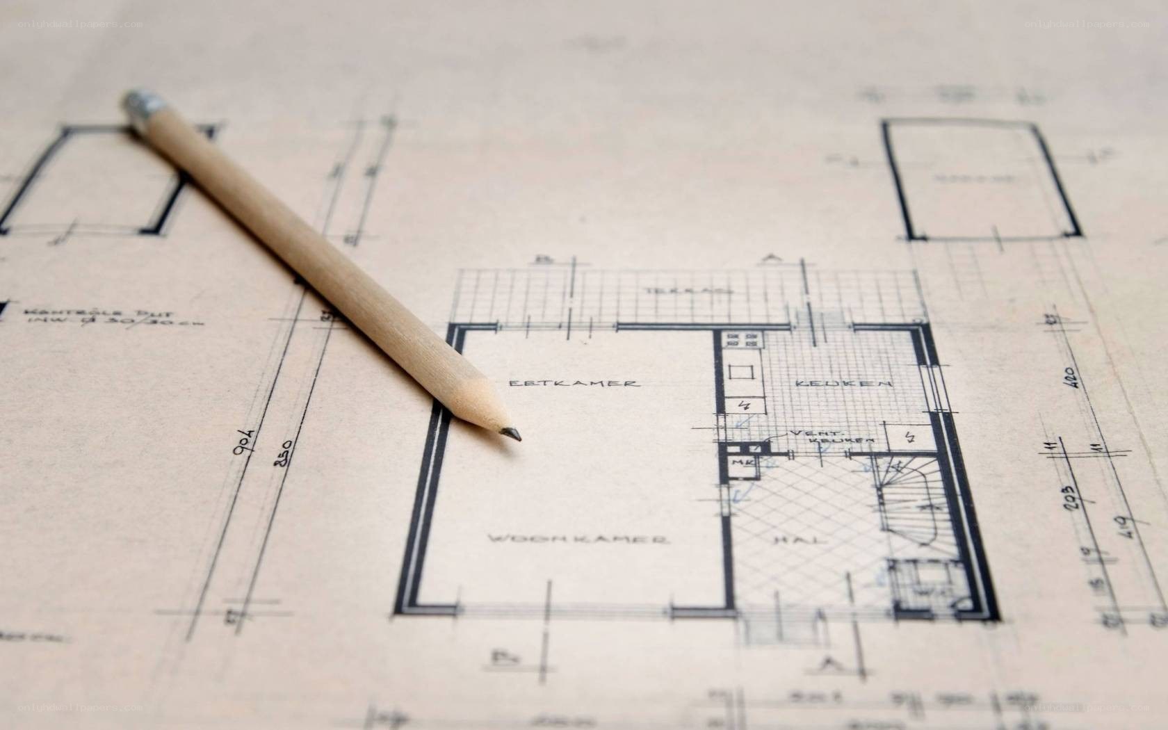 Architectural blueprint with pencil
