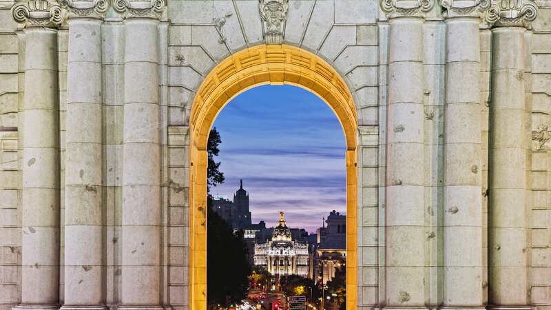 Archway view of Madrid skyline