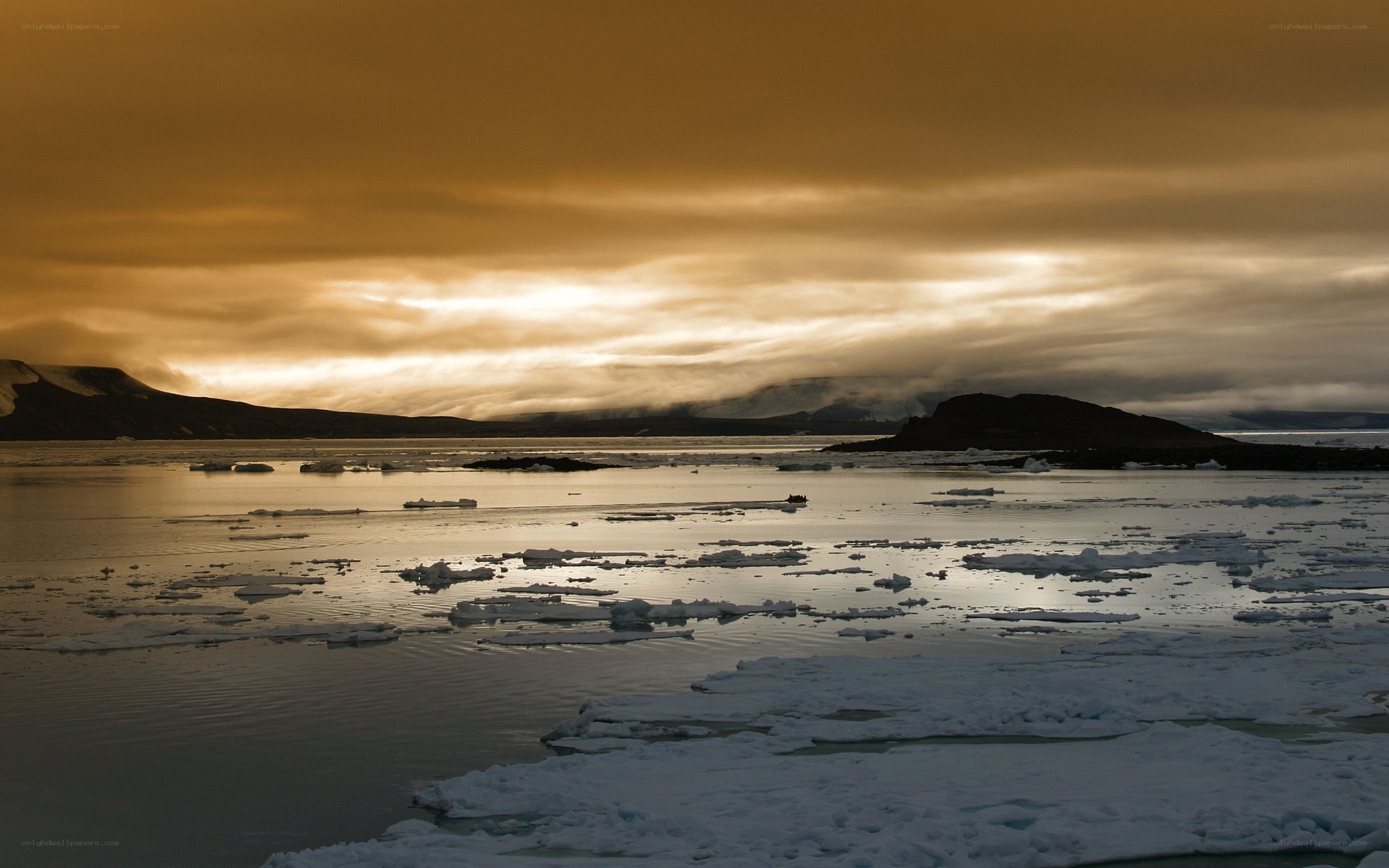Arctic ice floes at sunset