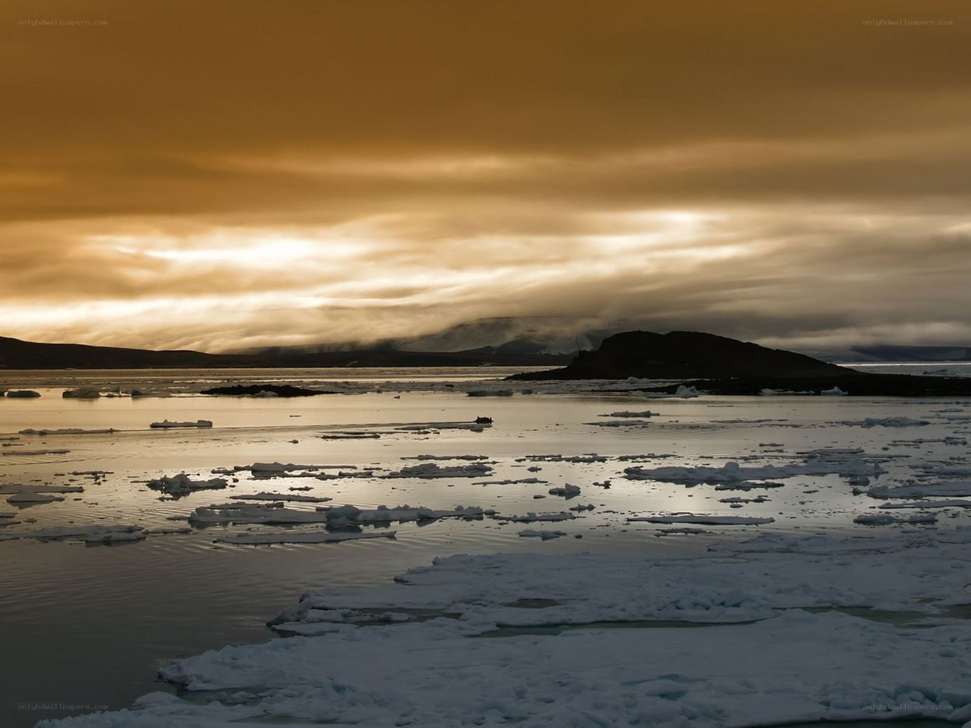 Arctic ice floes at sunset
