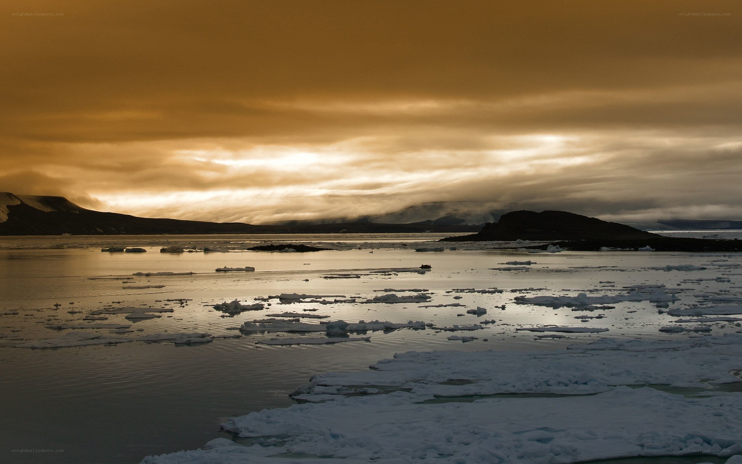 Arctic ice floes at sunset