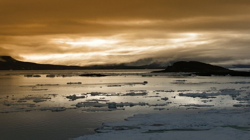 Arctic sunset with ice floes