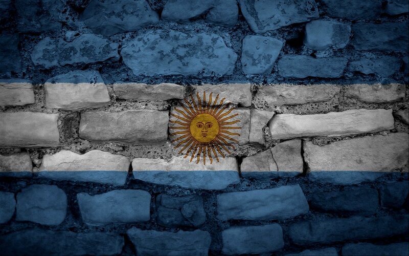 Argentine flag on stone wall