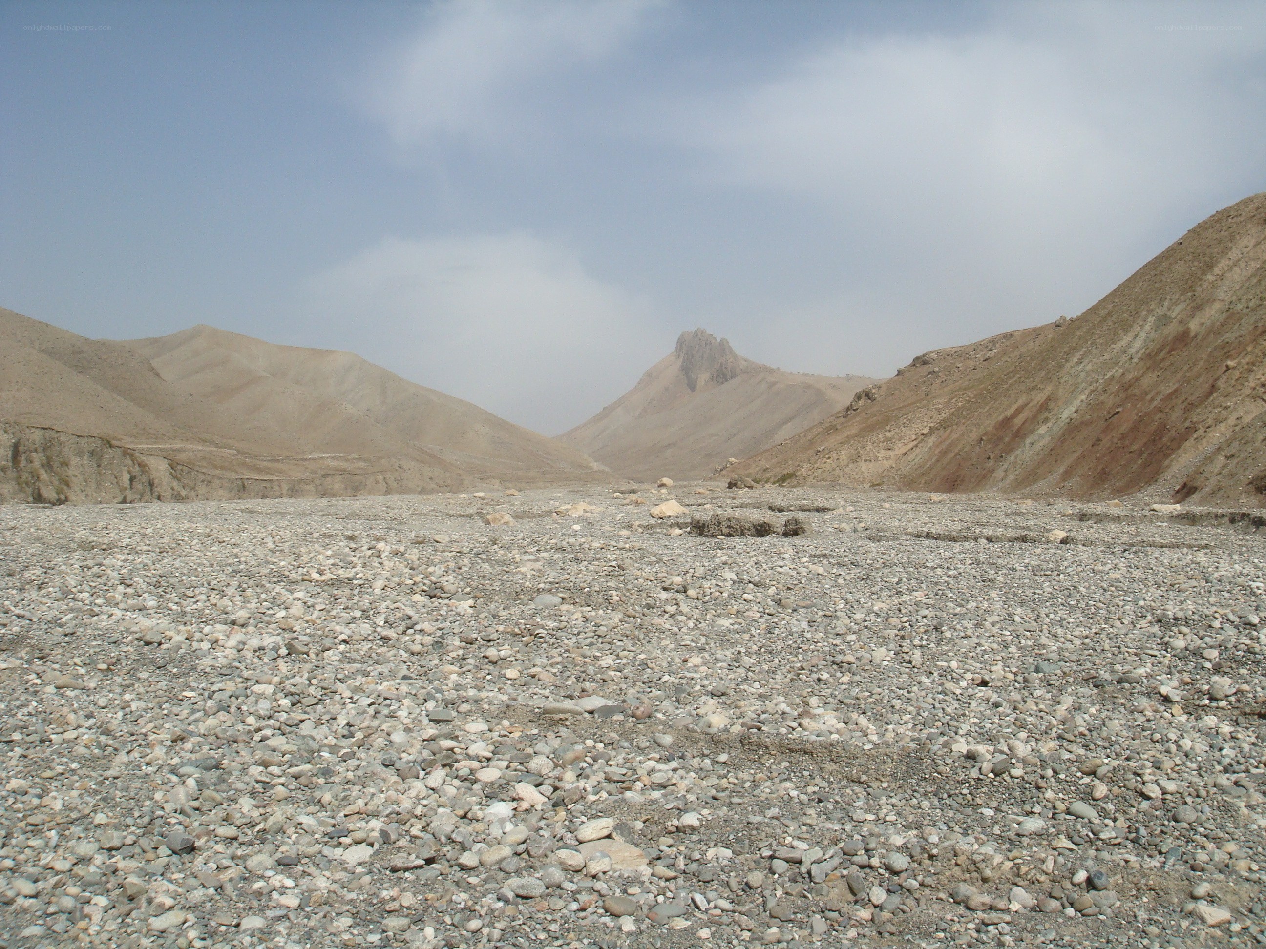 arid valley with rocky terrain