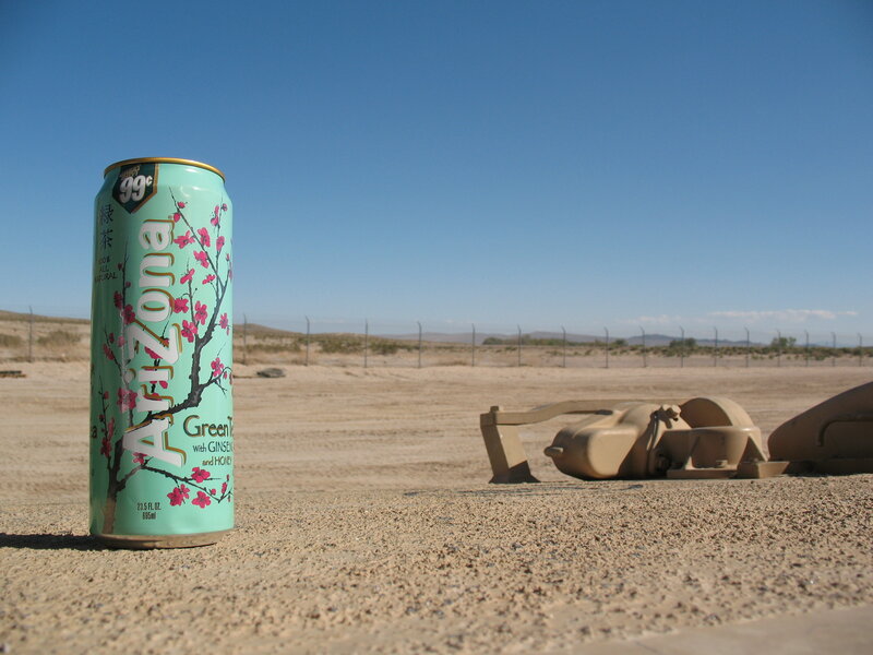 Arizona Green Tea can in desert