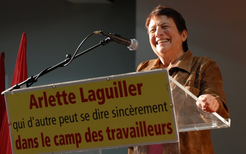 Arllette Laguiller speaking at podium