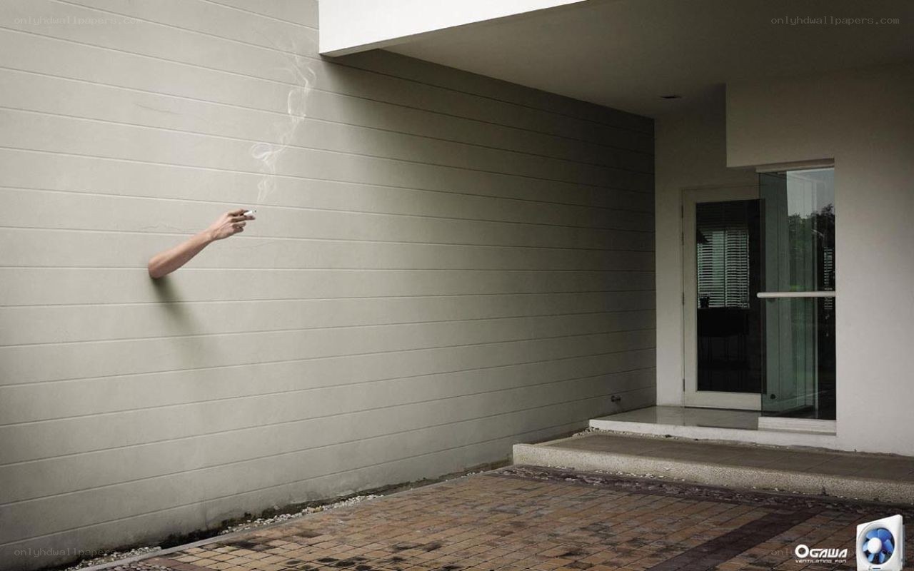Arm emerging from wall