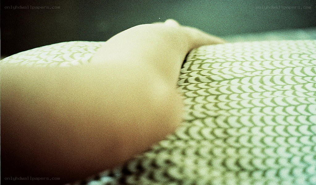 arm on patterned fabric