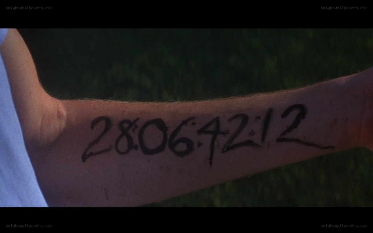 arm with date written on it