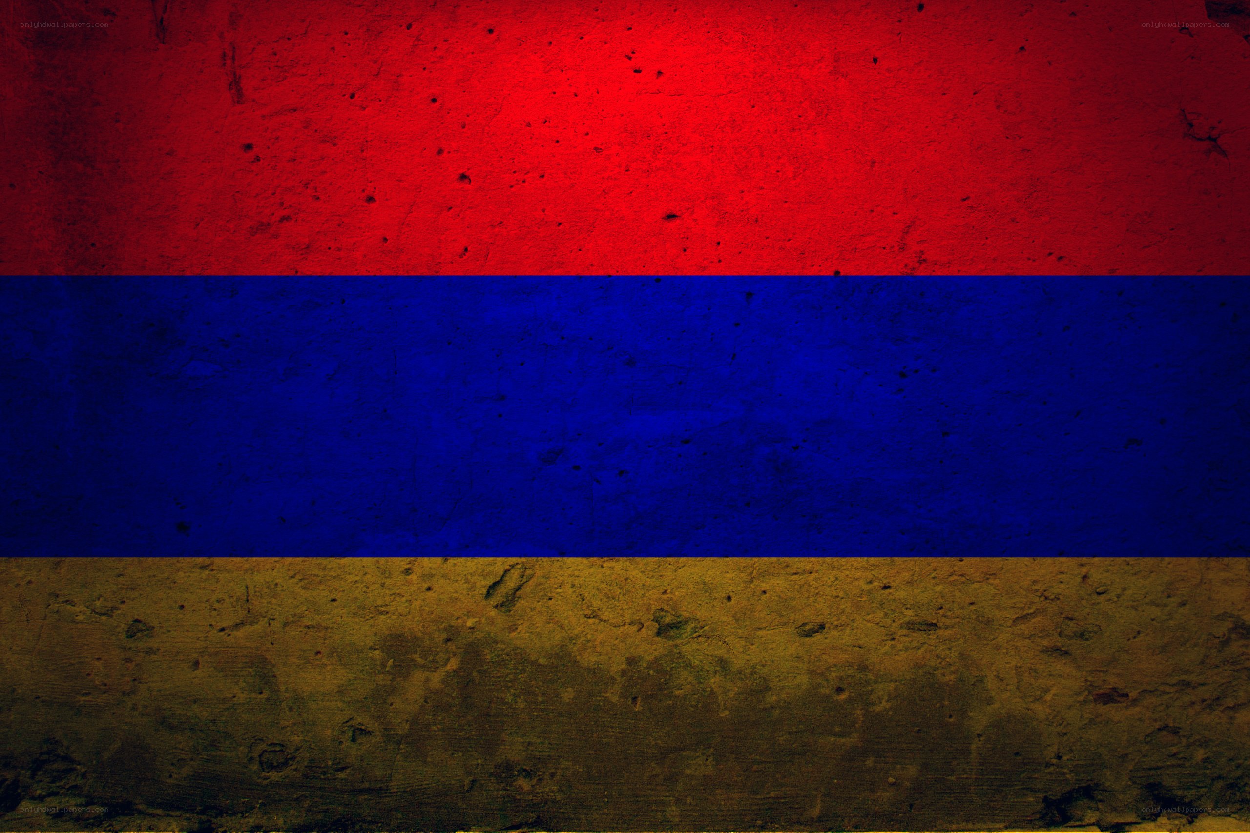 Armenian flag on textured wall