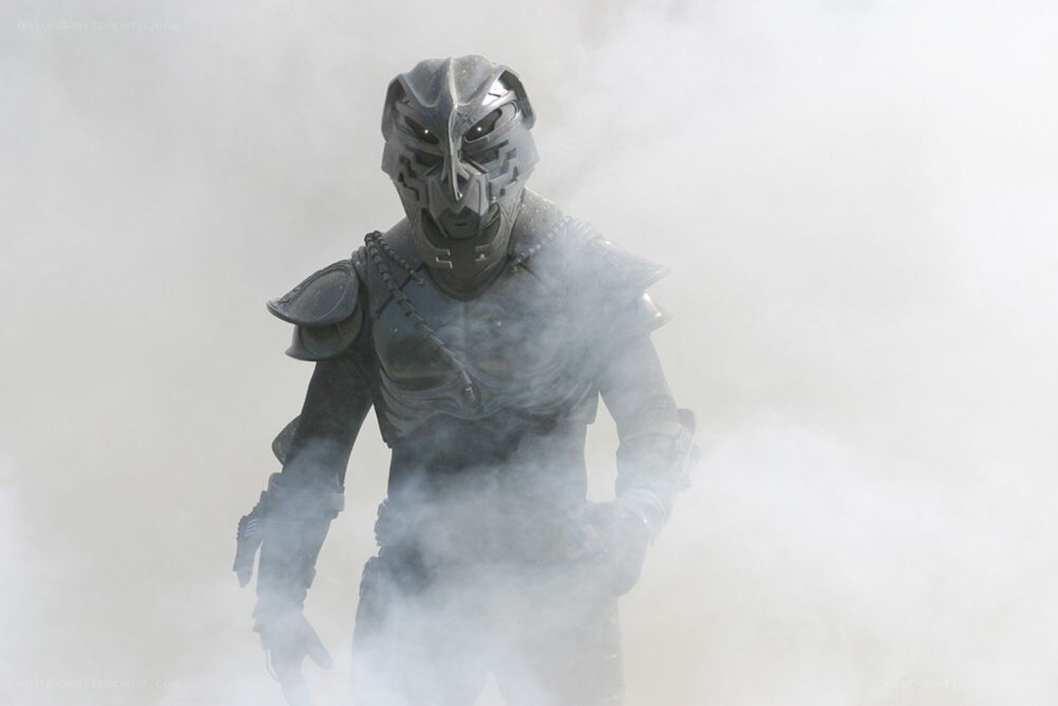 armored figure in smoke