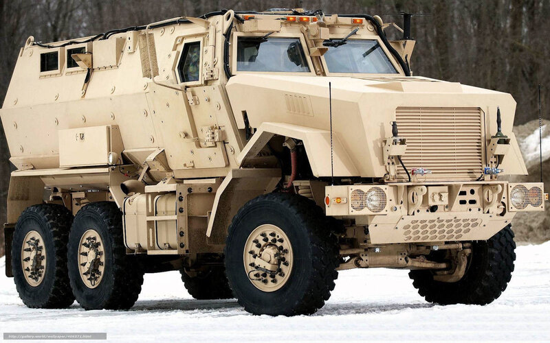 armored military vehicle in snow