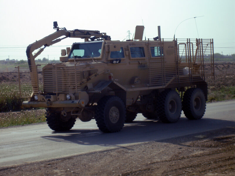 armored military vehicle on road