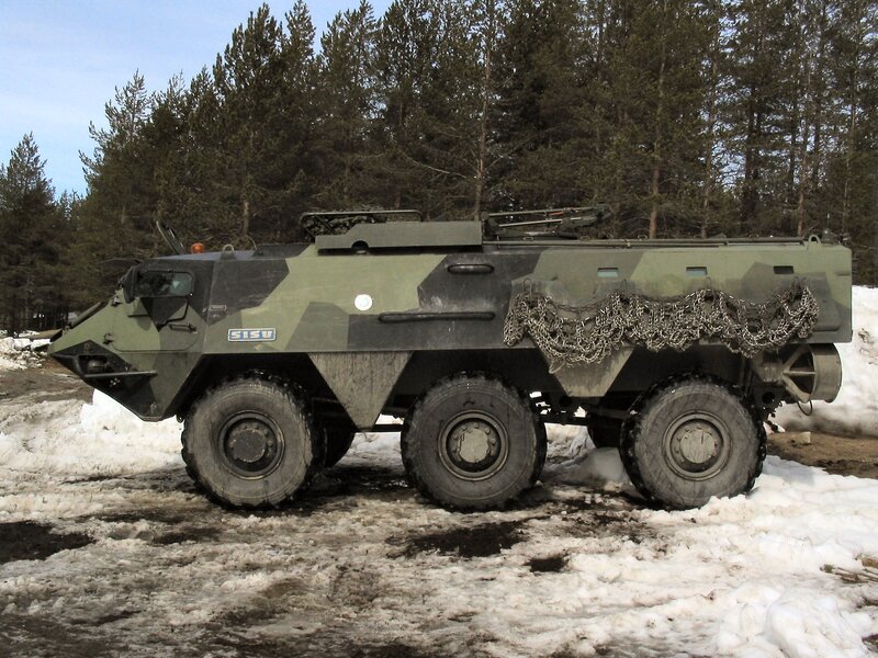 armored vehicle in snowy forest