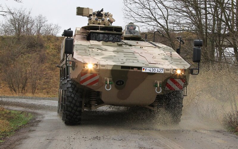 armored vehicle on muddy road