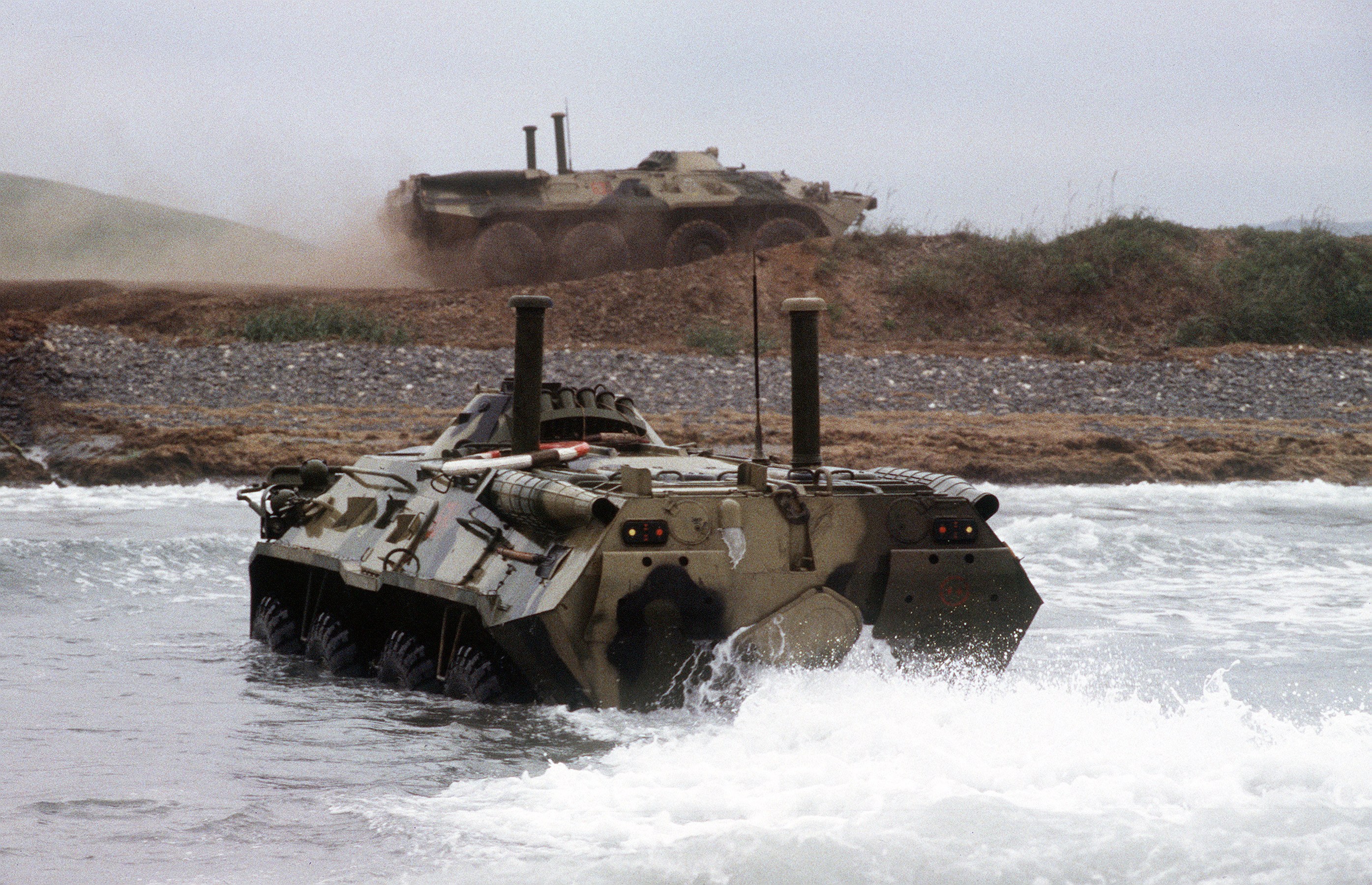 Armored vehicles crossing water