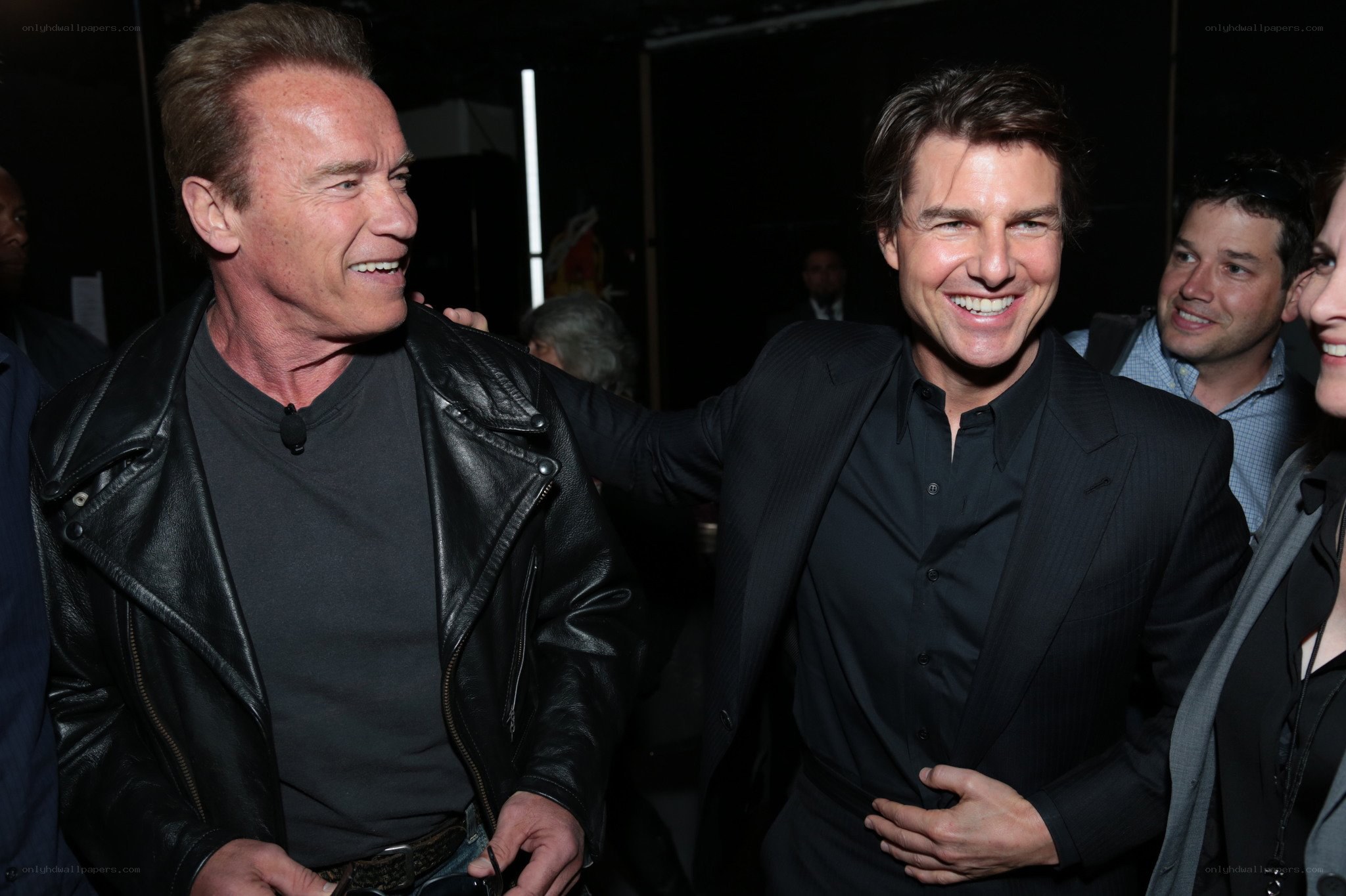 Arnold Schwarzenegger and Tom Cruise at event