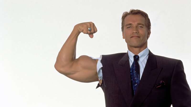 Arnold Schwarzenegger flexing arm