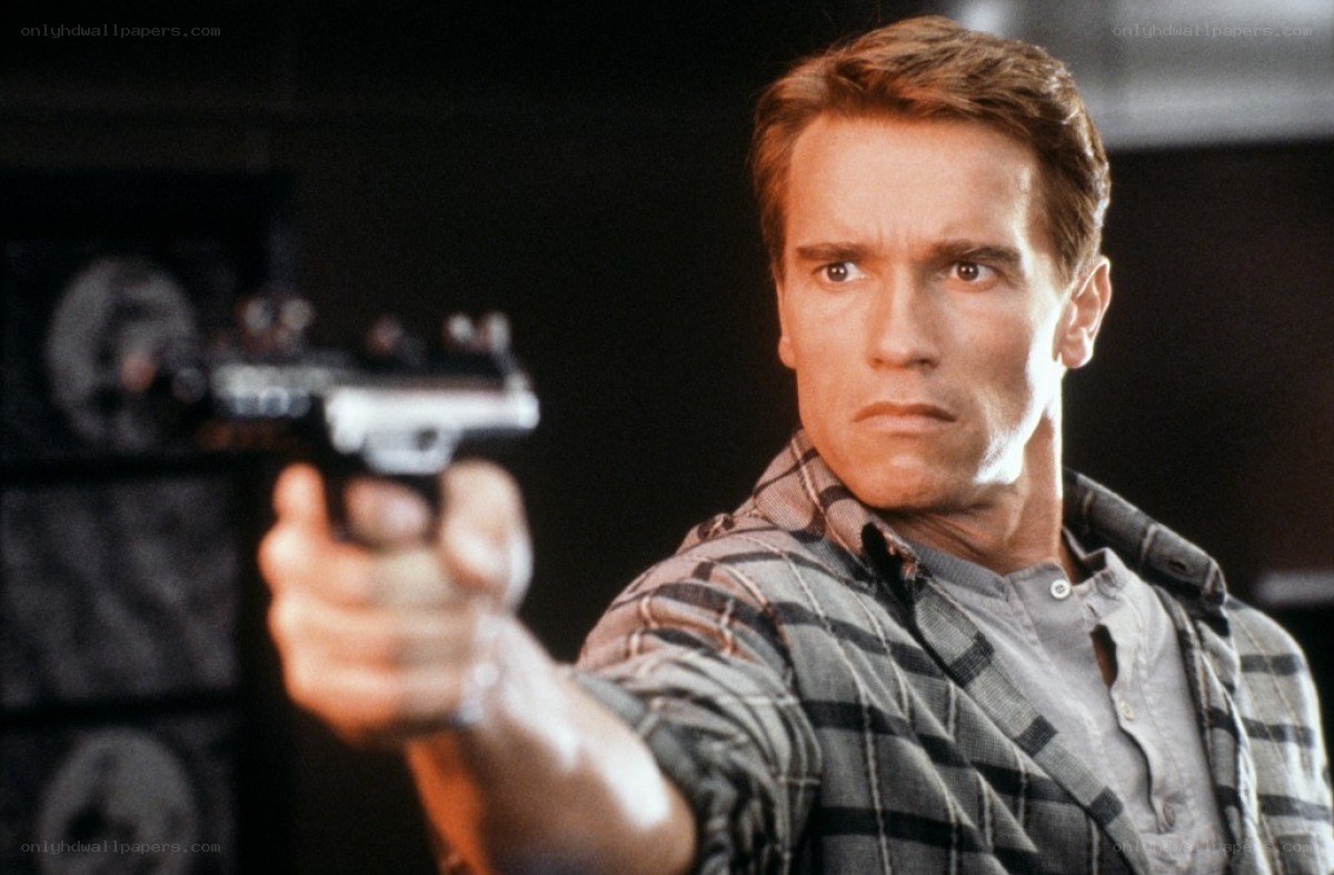 Arnold Schwarzenegger holding a gun