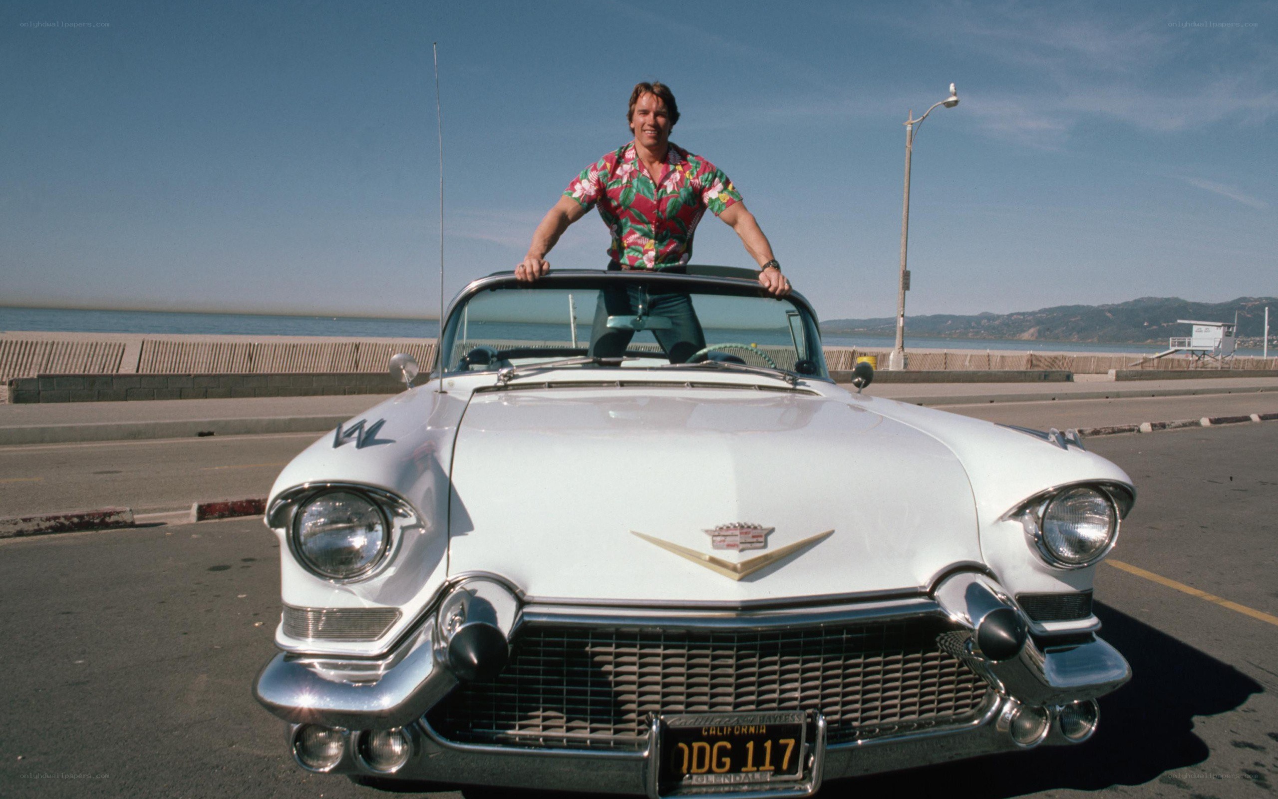 Arnold Schwarzenegger in a classic car