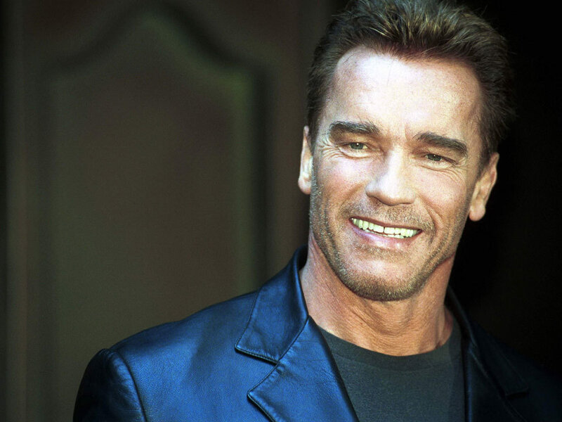 Arnold Schwarzenegger smiling