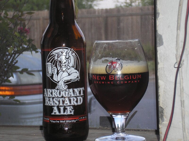 Arrogant Bastard Ale bottle and glass