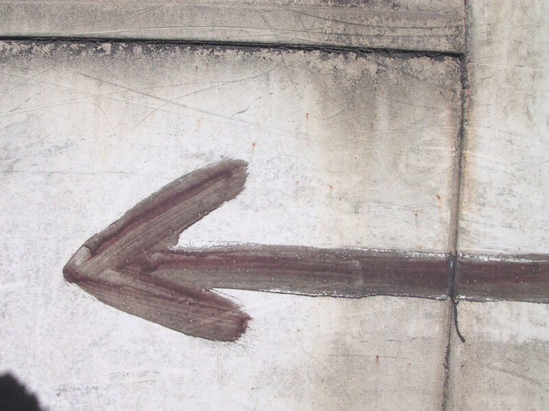 arrow painted on concrete
