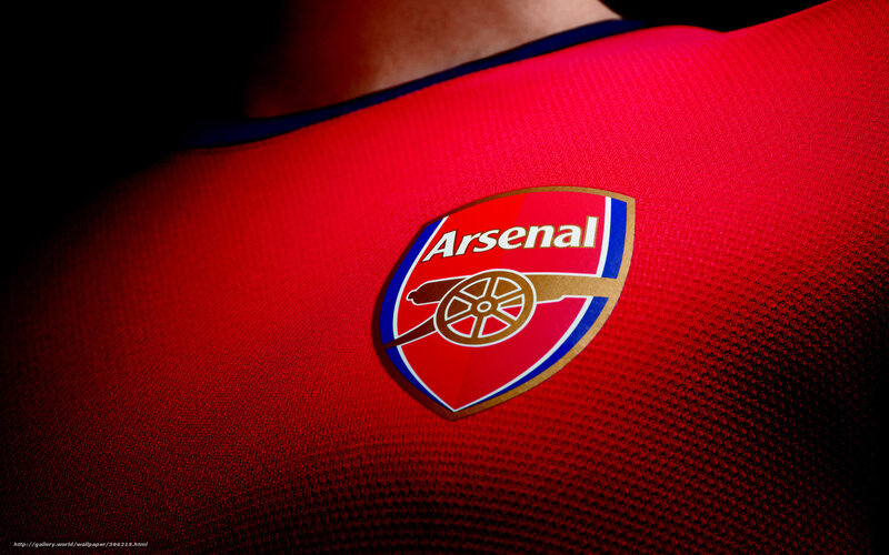 Arsenal FC crest on red jersey