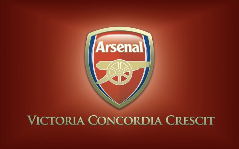 Arsenal FC crest with motto
