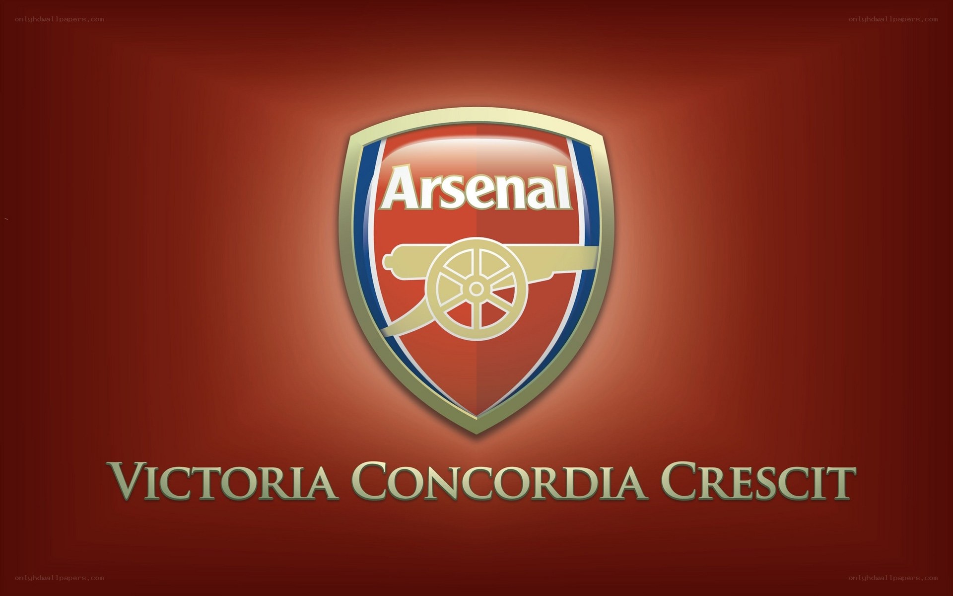 Arsenal FC crest with motto