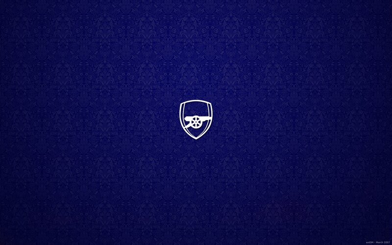 Arsenal FC logo on patterned background