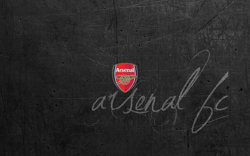 Arsenal FC logo on textured background