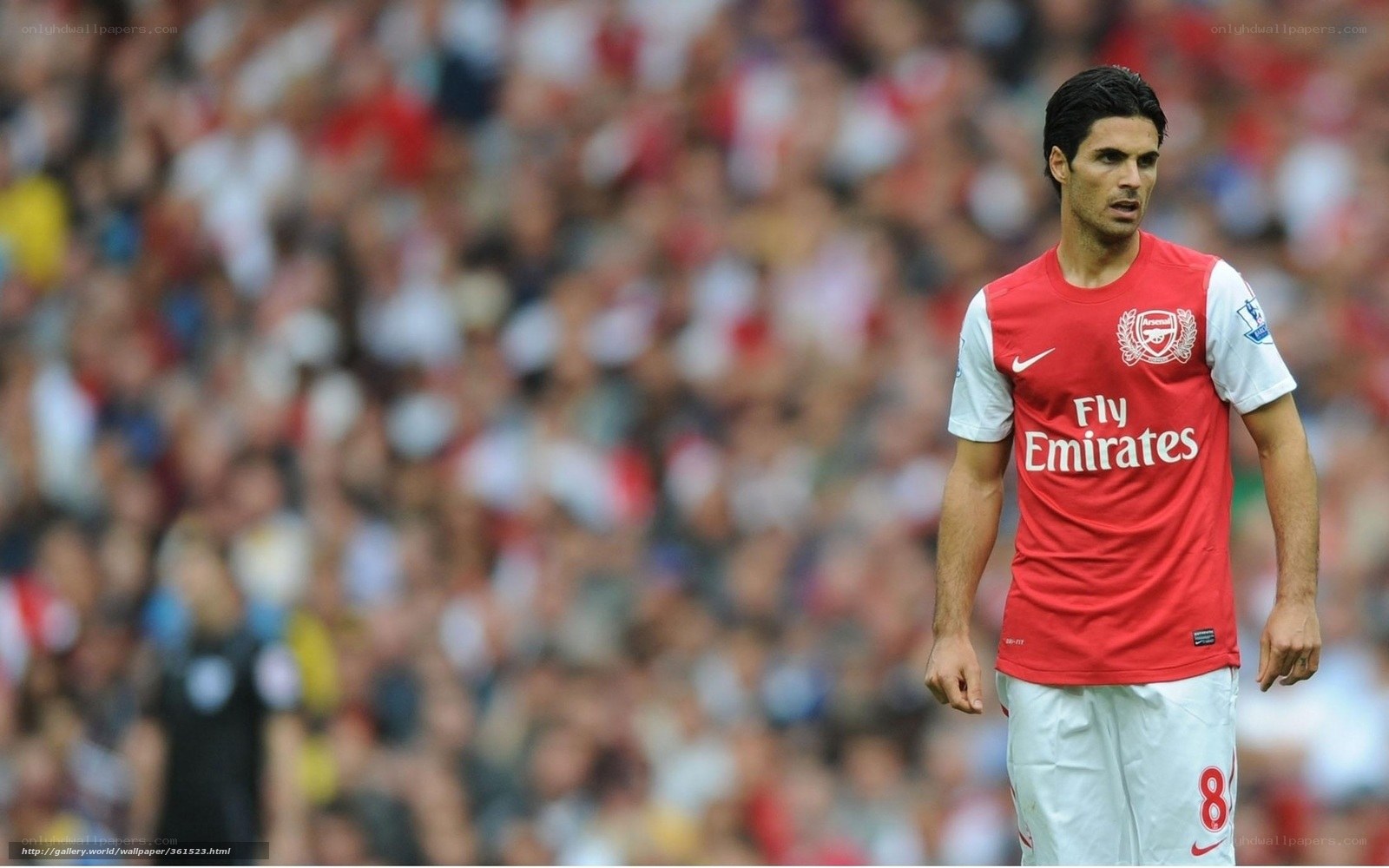 Arsenal football player on field